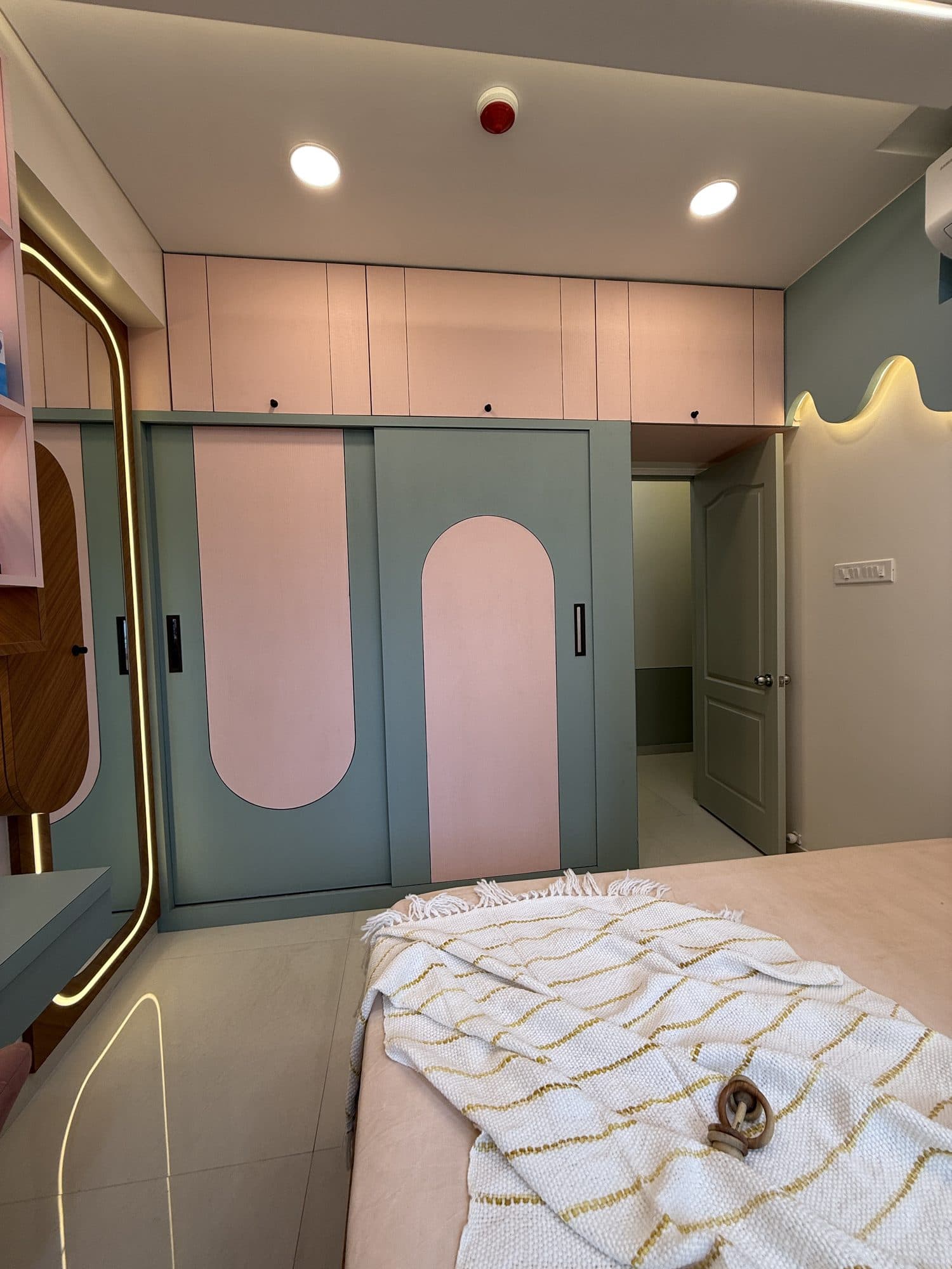 Master Bedroom in a Goregaon, Mumbai home by Divya Jain Interiors