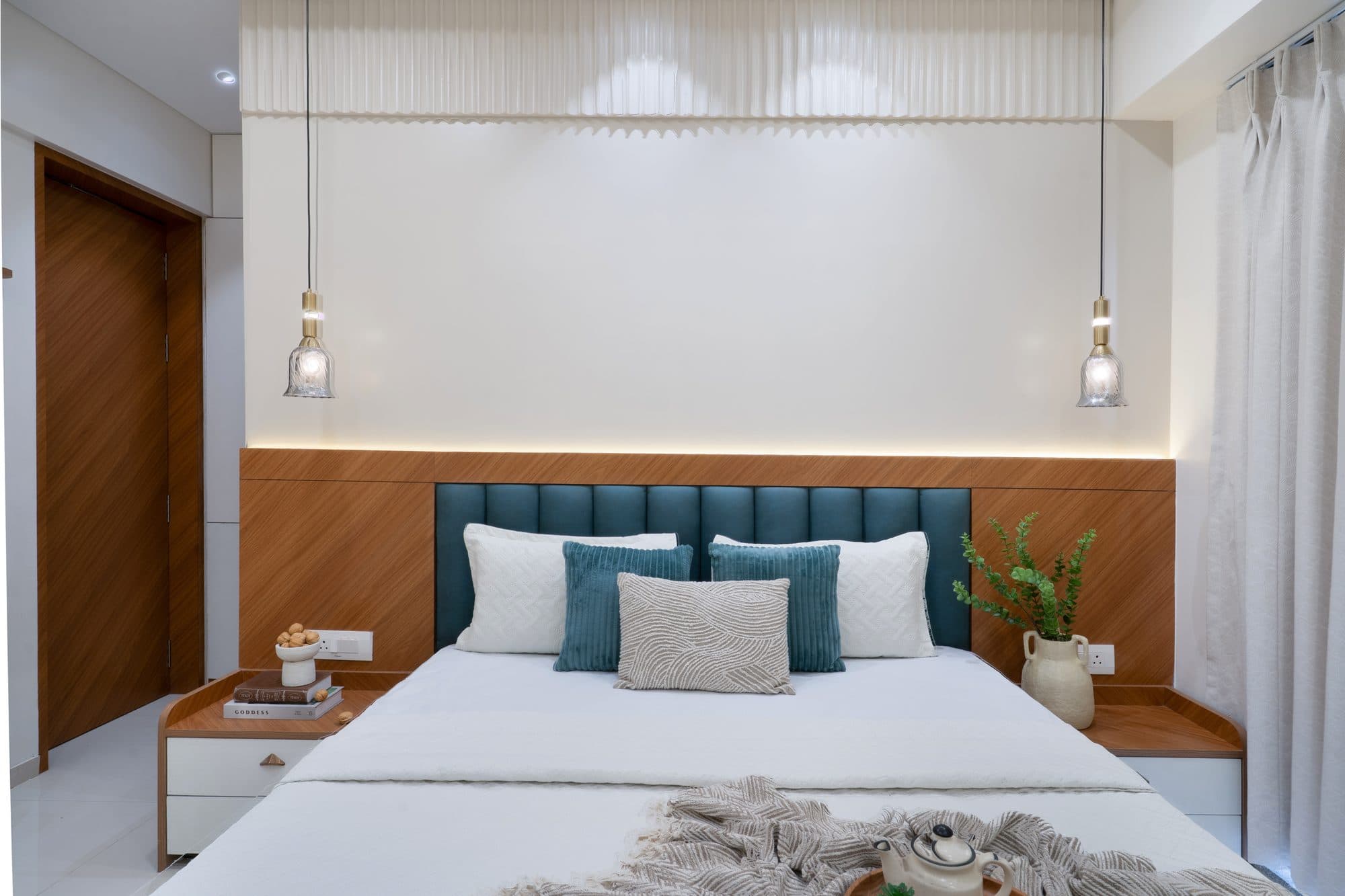 Master Bedroom in a Ravet, Pune home by Divya Jain Interiors